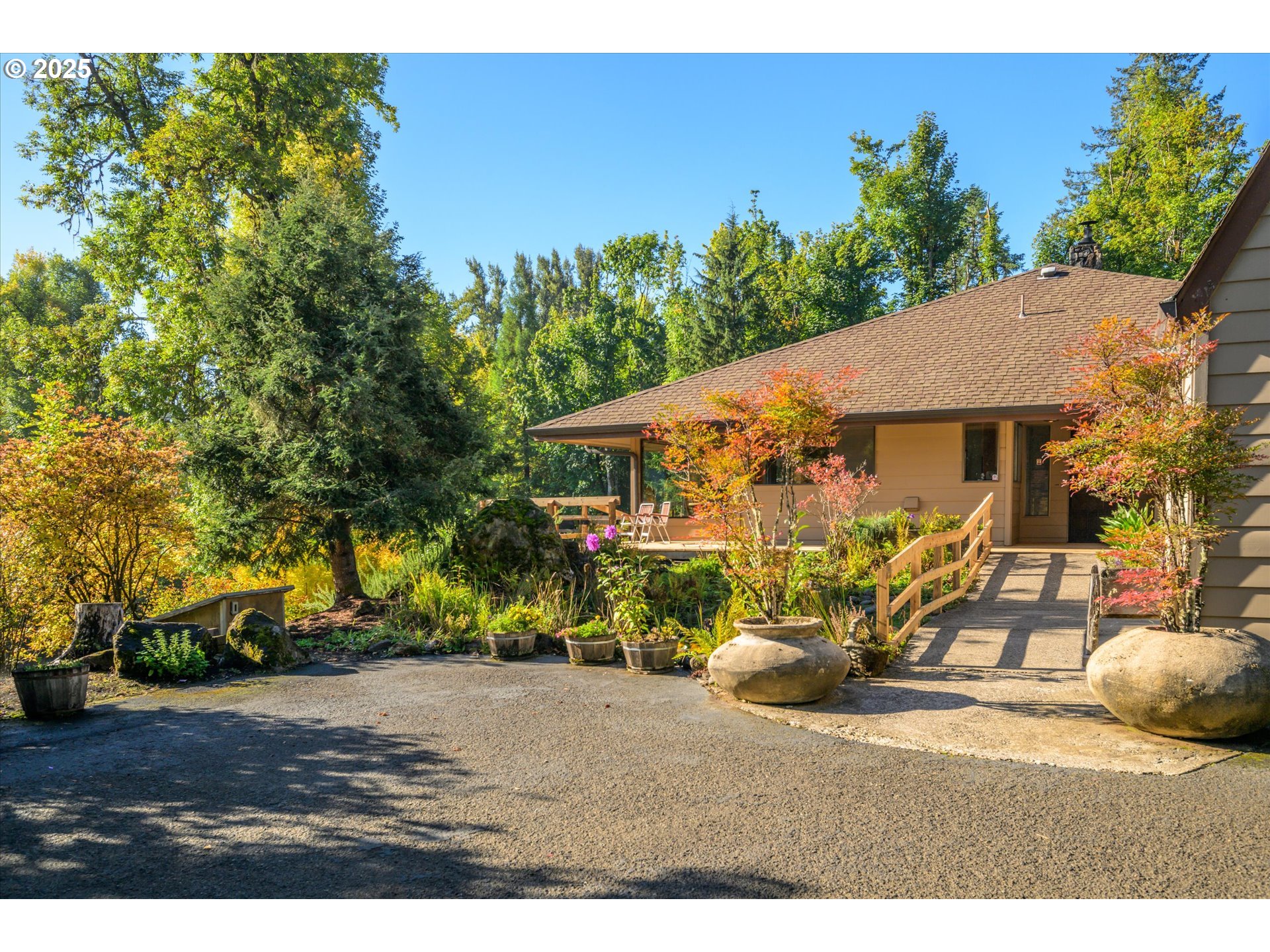 35012 McKenzie View Drive Springfield, OR 97478 - Photo 3 of 47 a view of a house with backyard and sitting area