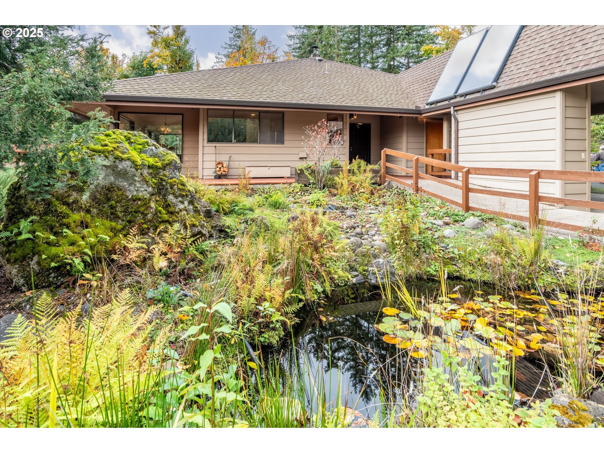 35012 McKenzie View Drive Springfield, OR 97478 - Photo 38 of 47 a front view of house with yard and trees around