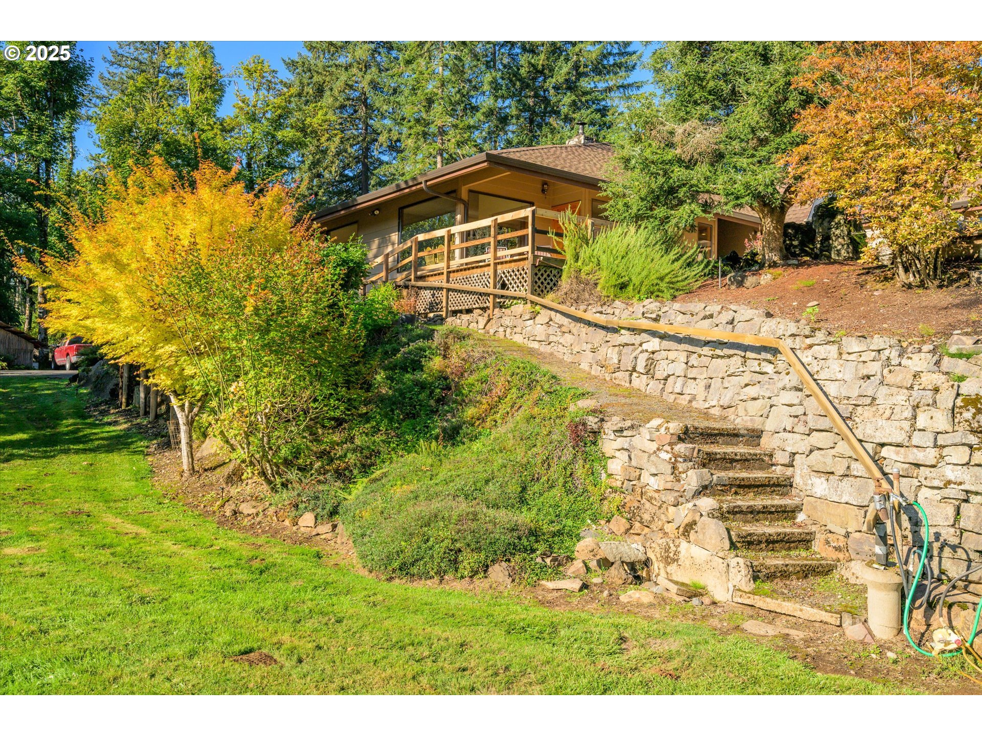 35012 McKenzie View Drive Springfield, OR 97478 - Photo 39 of 47 a view of a yard with a house in the background