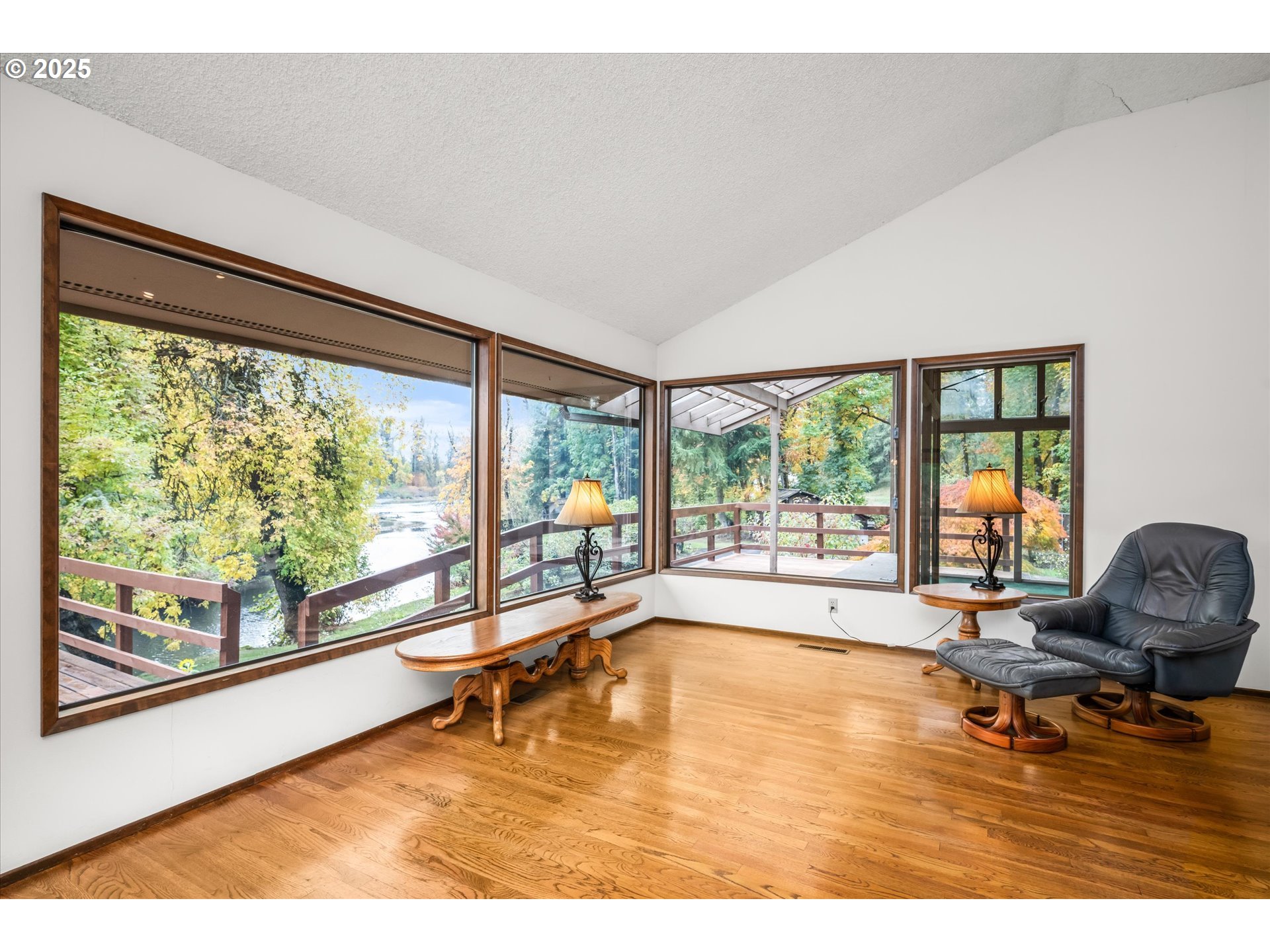 35012 McKenzie View Drive Springfield, OR 97478 - Photo 4 of 47 a living room filled with furniture and a large window