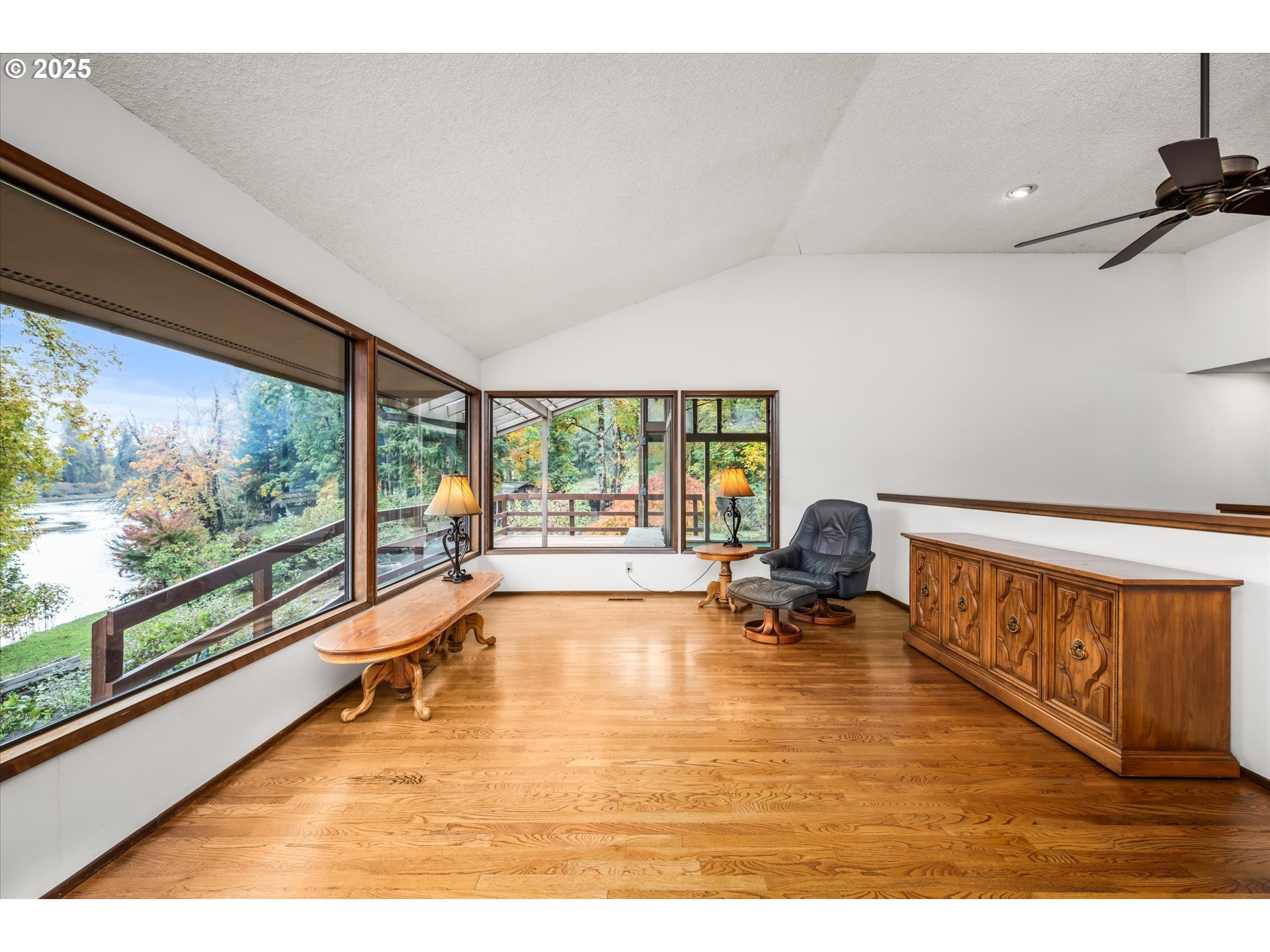 35012 McKenzie View Drive Springfield, OR 97478 - Photo 5 of 47 a living room with furniture and a large window