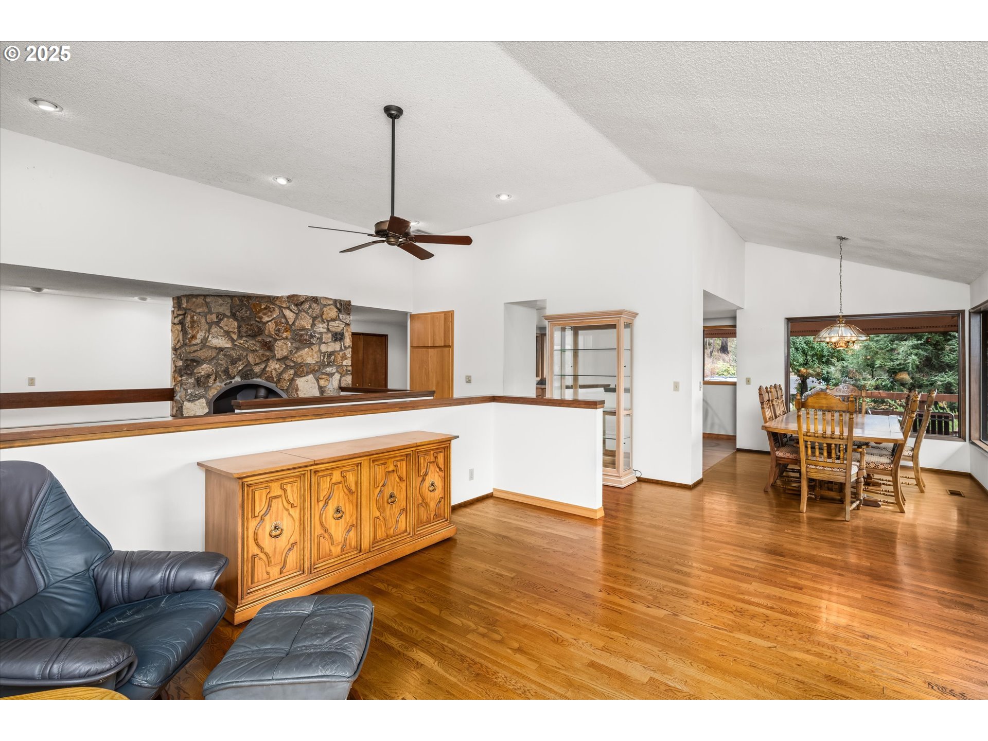 35012 McKenzie View Drive Springfield, OR 97478 - Photo 9 of 47 a living room with furniture and a large window