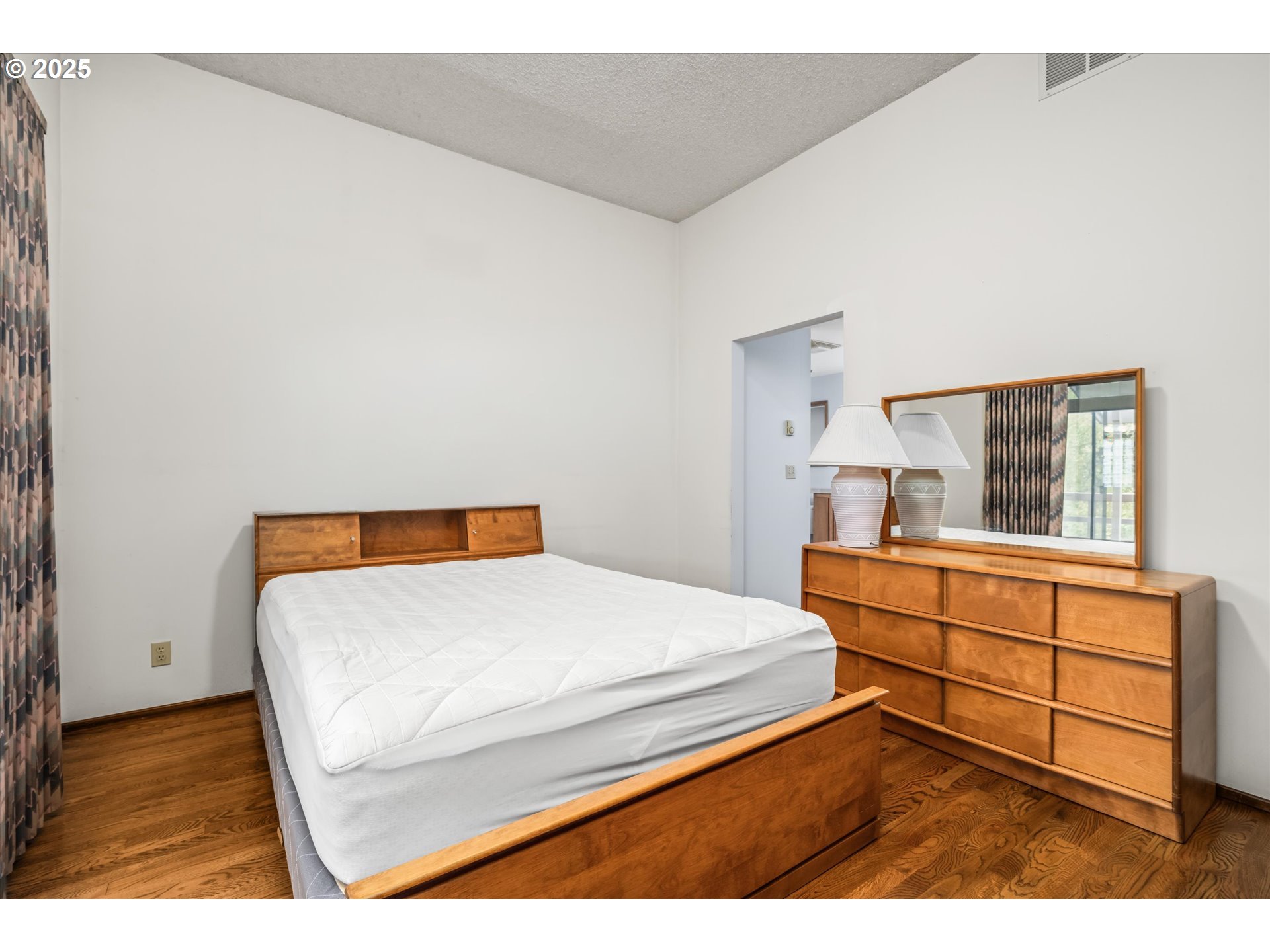 35012 McKenzie View Drive Springfield, OR 97478 - Photo 10 of 47 a bedroom with a bed and a dresser