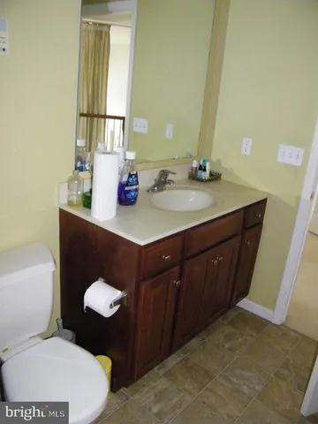 a room with a bed and a desk