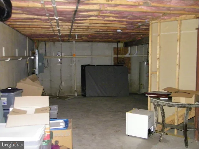 a room with storage and a white door