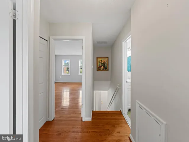 a backyard of a house with lots of green space and garden