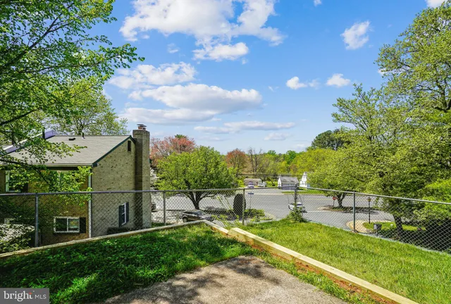 a view of a park with swings