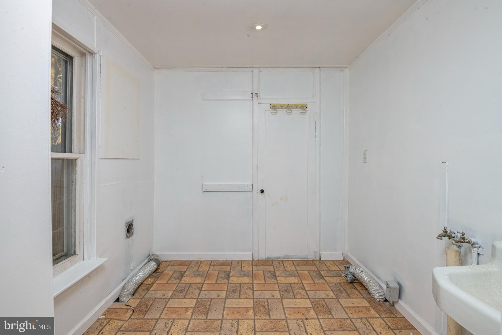 202 Water Street Oley, PA 19547 - Photo 16 of 30 a bathroom with a sink and a shower