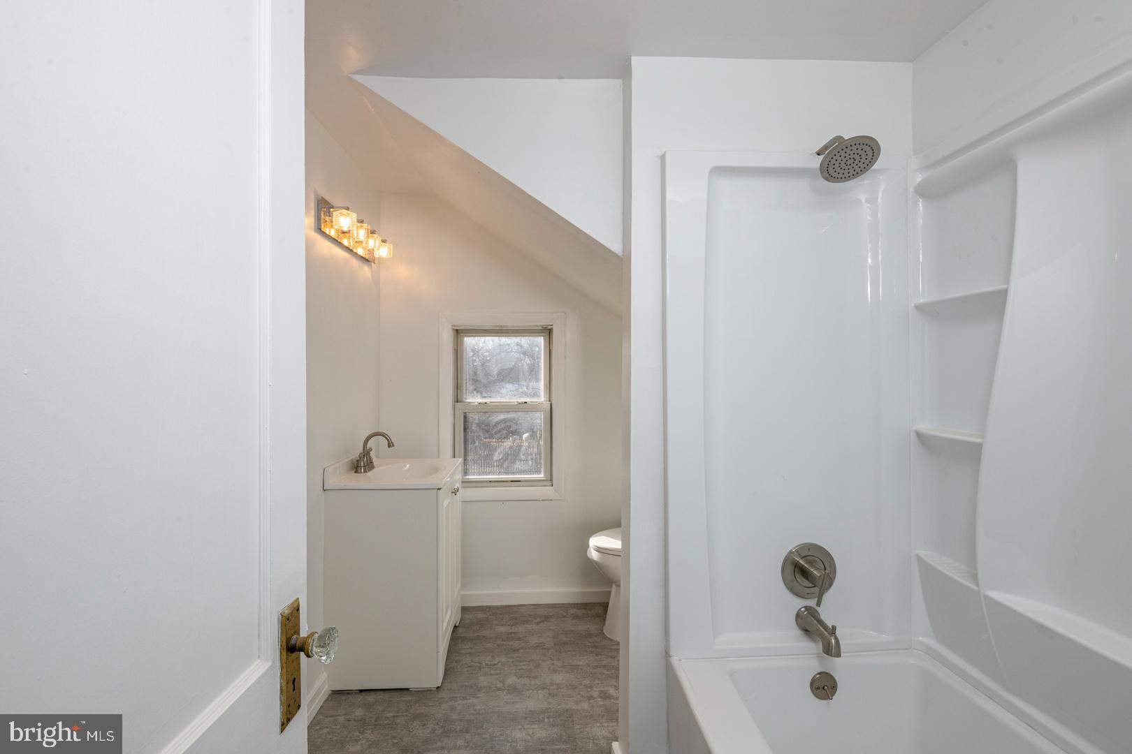 202 Water Street Oley, PA 19547 - Photo 20 of 30 a bathroom with a sink a toilet and shower