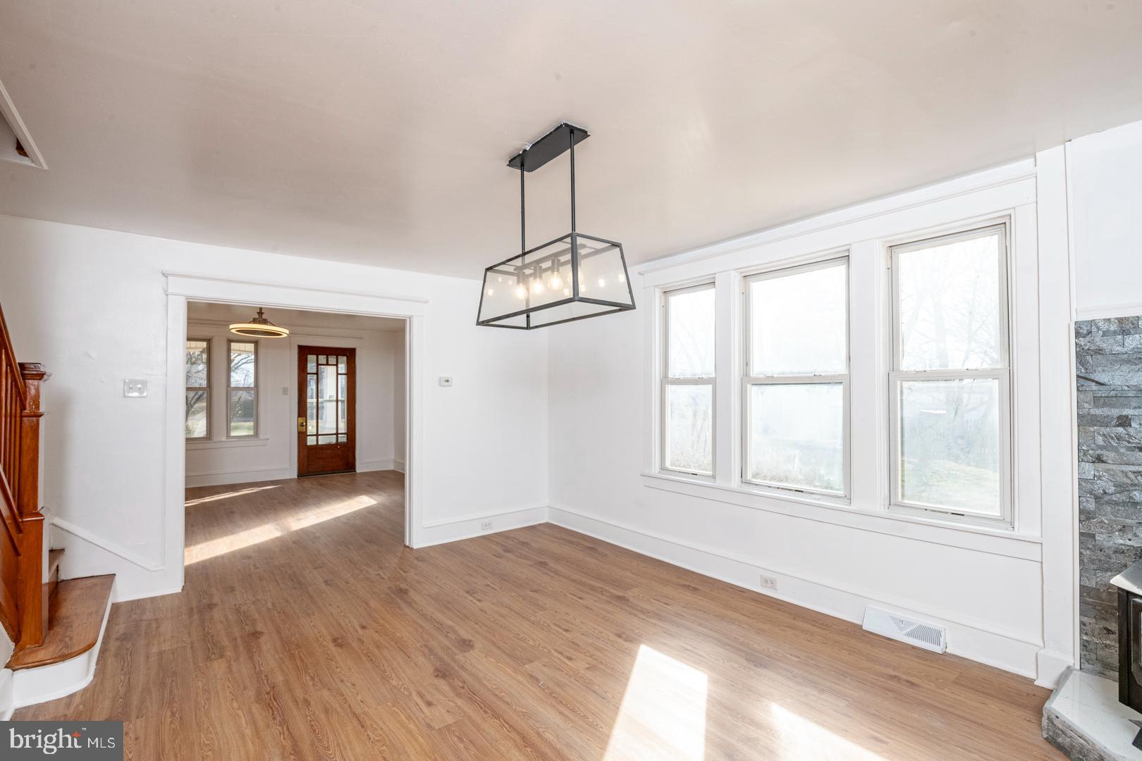 202 Water Street Oley, PA 19547 - Photo 7 of 30 wooden floor in an empty room with a window