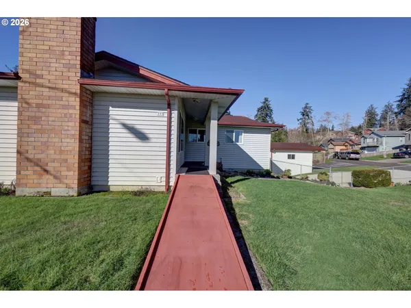 a house view with a garden space