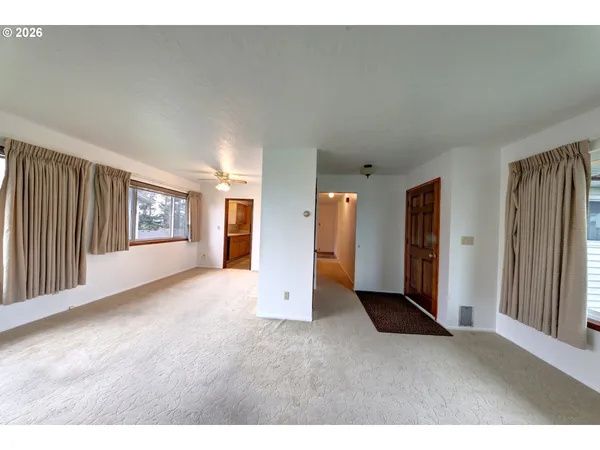 a view of a big room with closet area