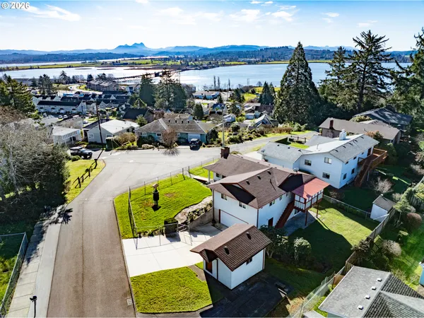 a view of yard from terrace with seating space