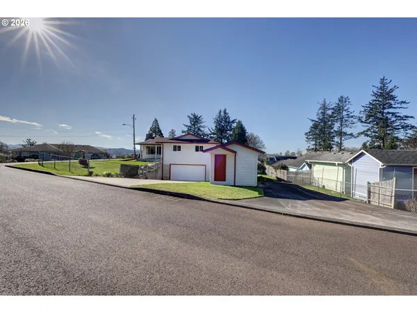 a open hall with a small yard