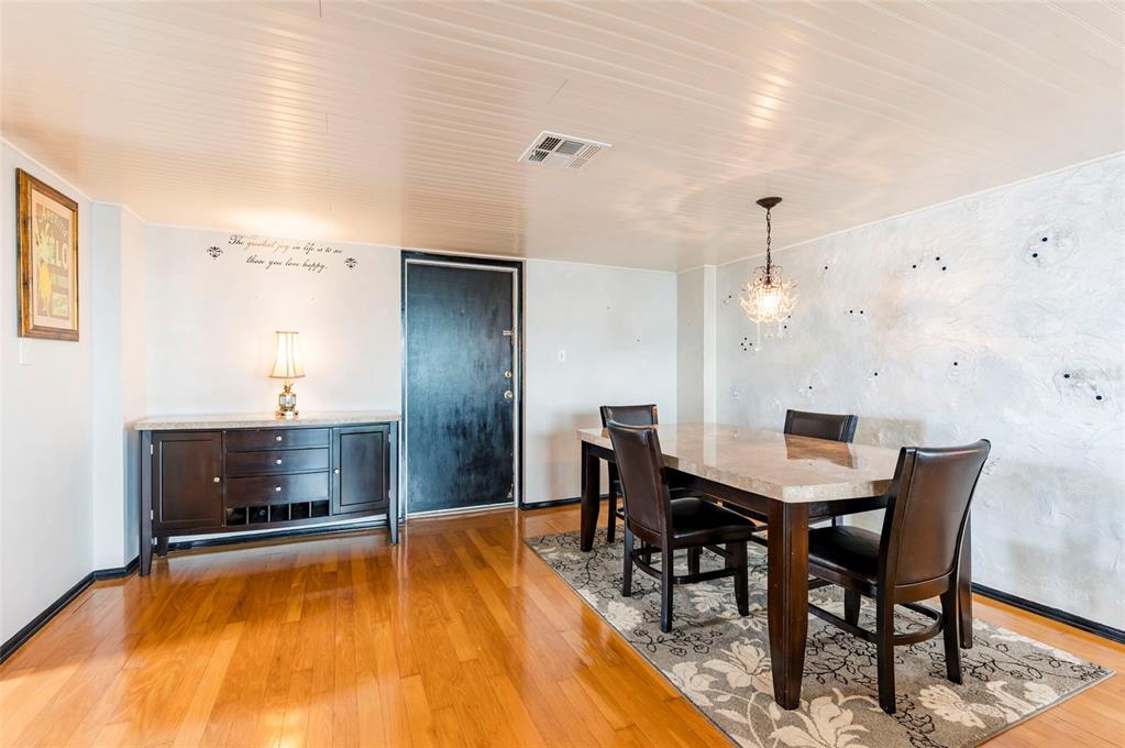9 Haig Place, Unit 801 Dunedin, FL 34698 - Photo 11 of 36 a view of a dining room with furniture