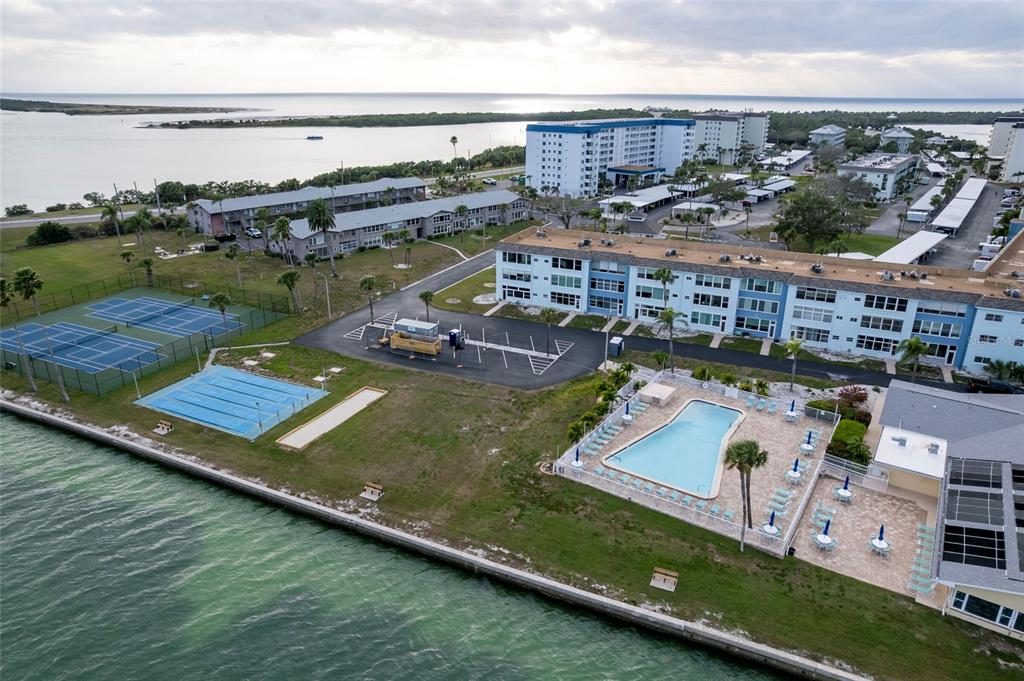 9 Haig Place, Unit 801 Dunedin, FL 34698 - Photo 34 of 36 a view of a house with a ocean view
