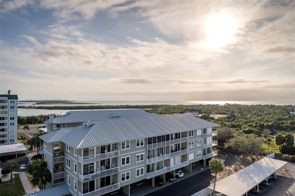 9 Haig Place, Unit 801 Dunedin, FL 34698 - Photo 6 of 36 an aerial view of multi story buildings