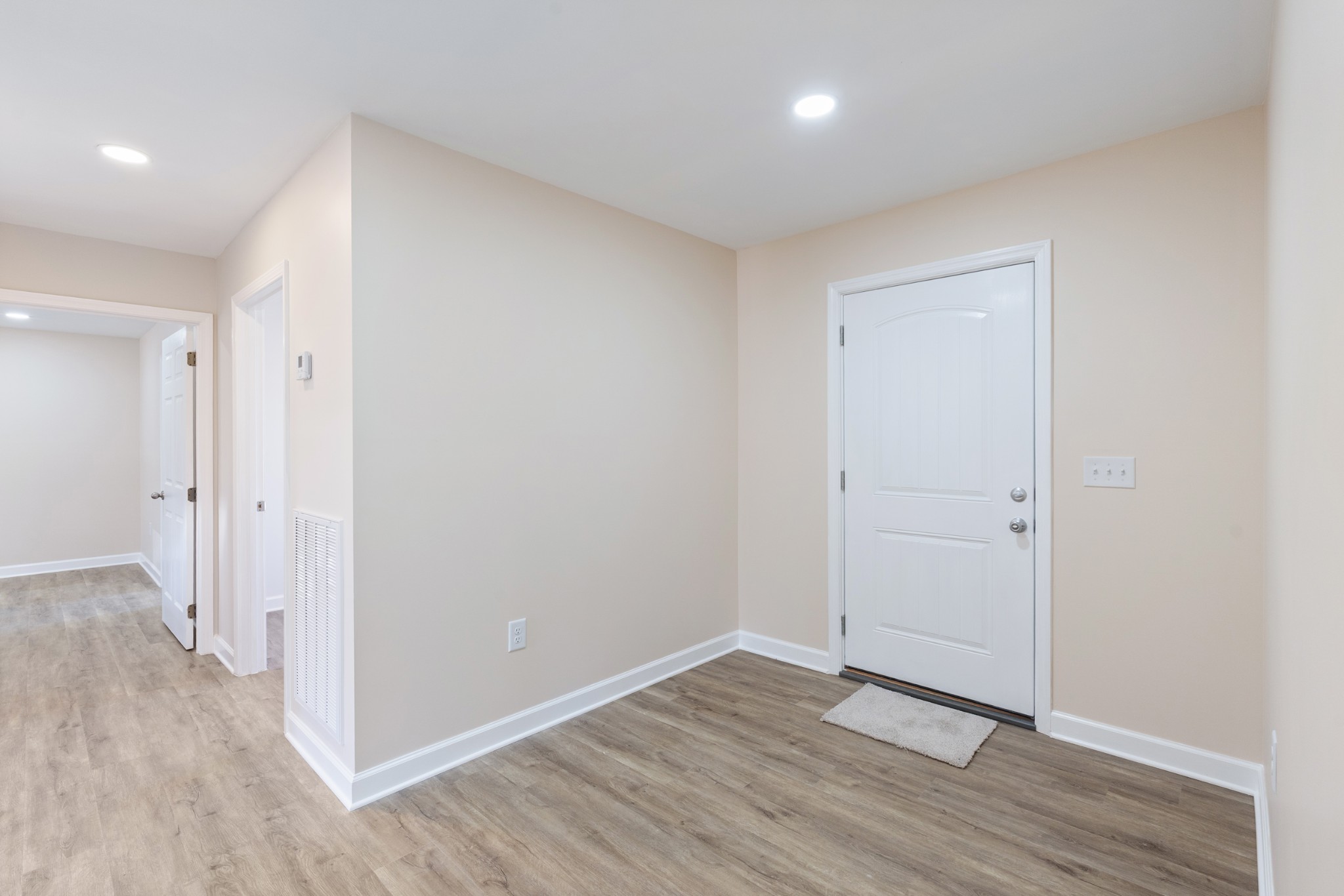654 West Main Street Hohenwald, TN 38462 - Photo 30 of 33 a view of an empty room with wooden floor
