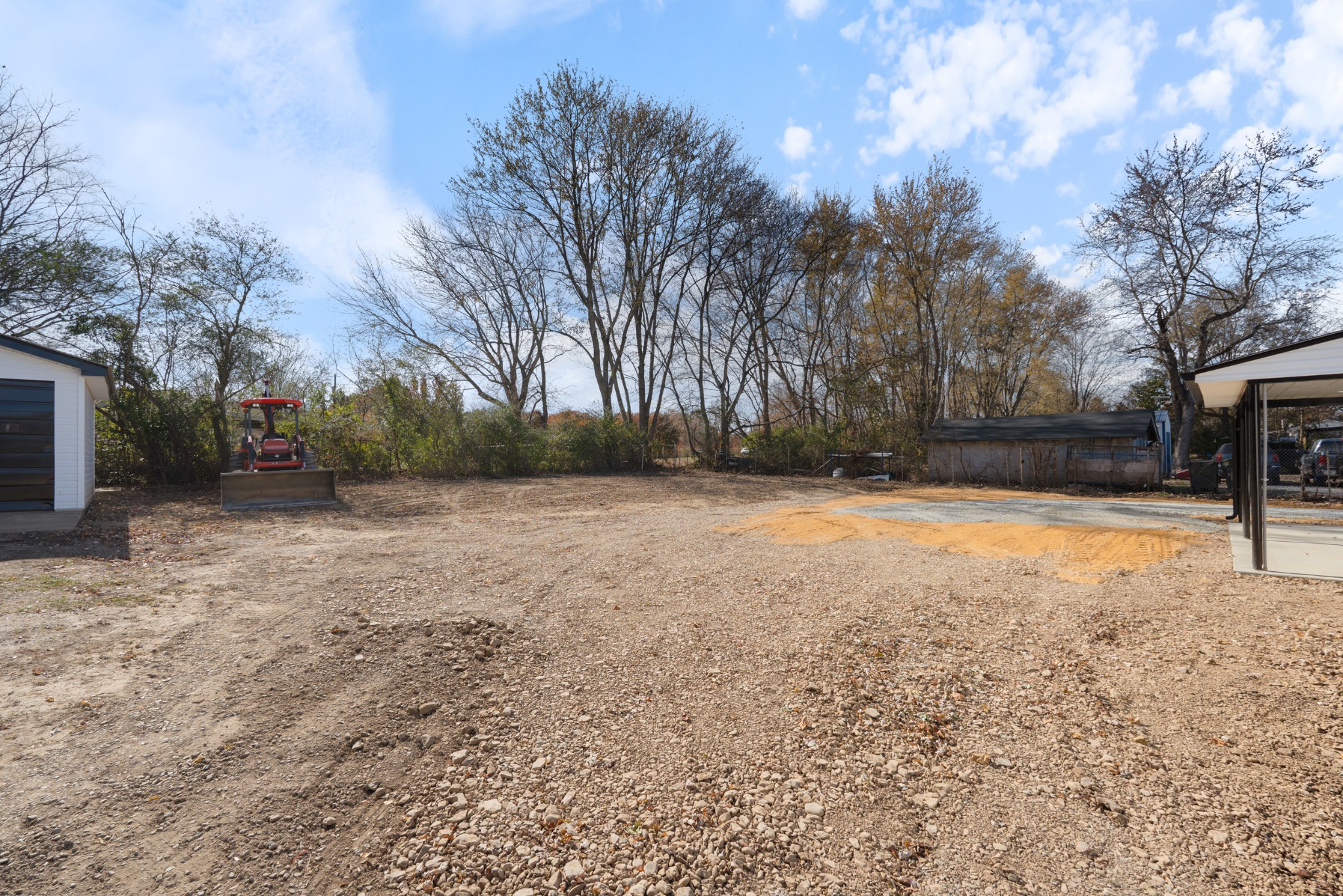 654 West Main Street Hohenwald, TN 38462 - Photo 5 of 33 a view of yard covered with snow in front of house