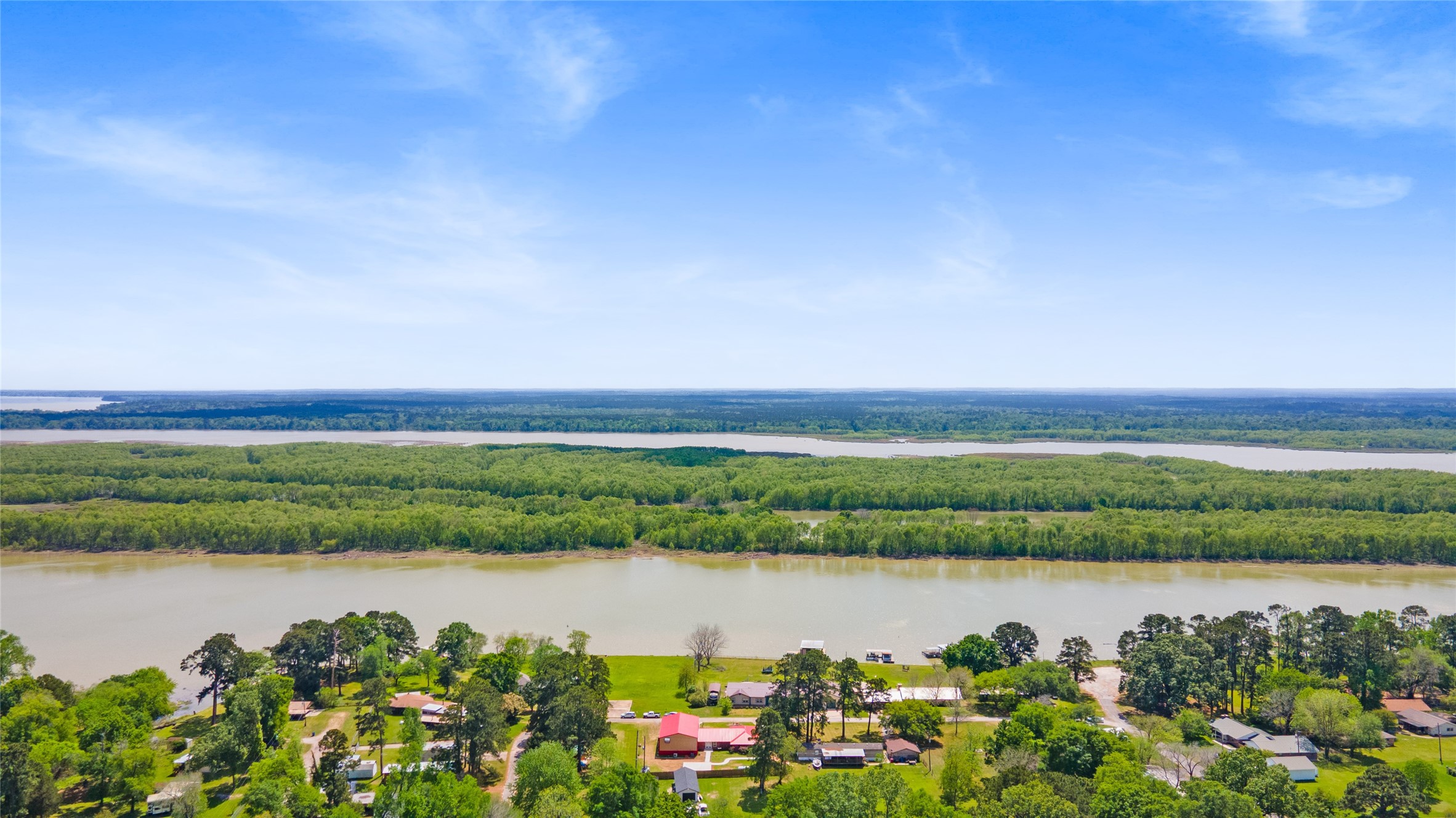 174 Lake Front Drive Trinity, TX 75862 - Photo 43 of 44 a view of a lake with a city
