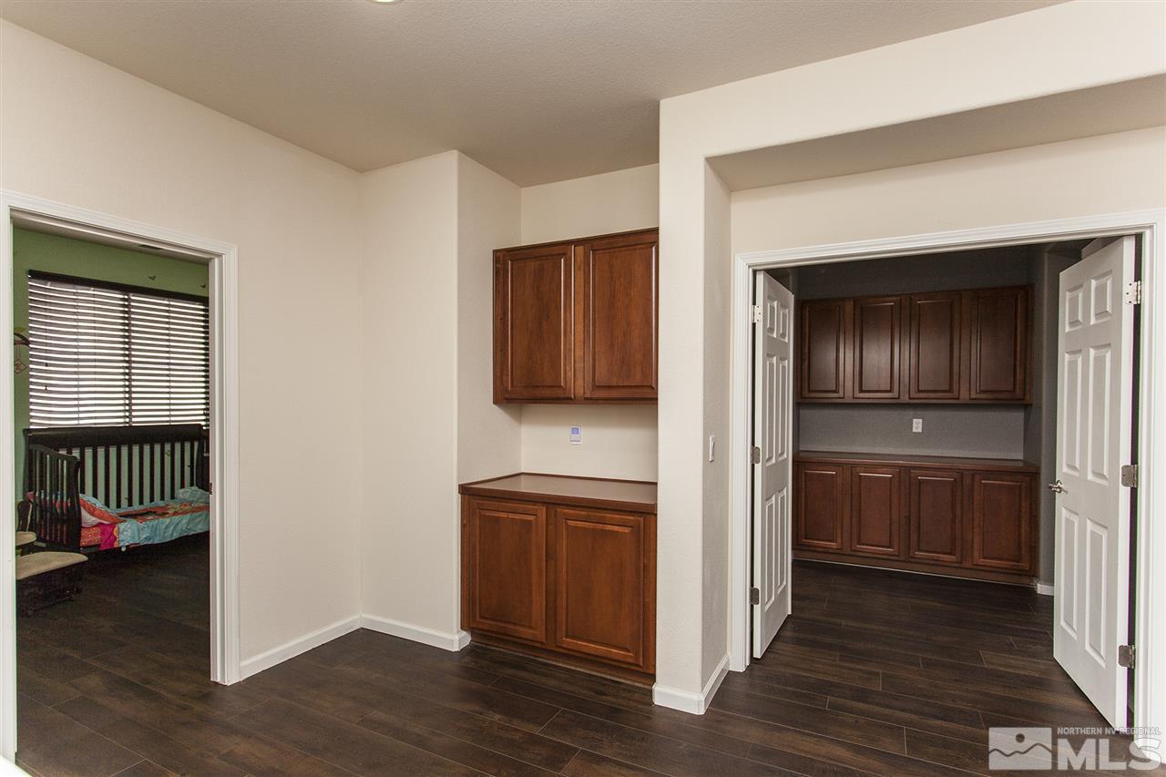 570 Needles Court Reno, NV 89521 - Photo 13 of 18 a view of front door with wooden floor