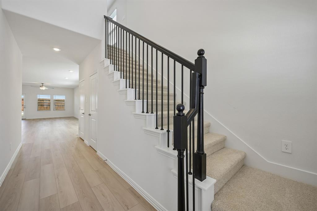 1705 Arches Road Anna, TX 75409 - Photo 6 of 33 a view of entryway and hall with wooden floor