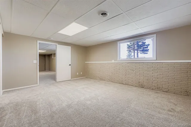 a bathroom with a sink toilet and vanity