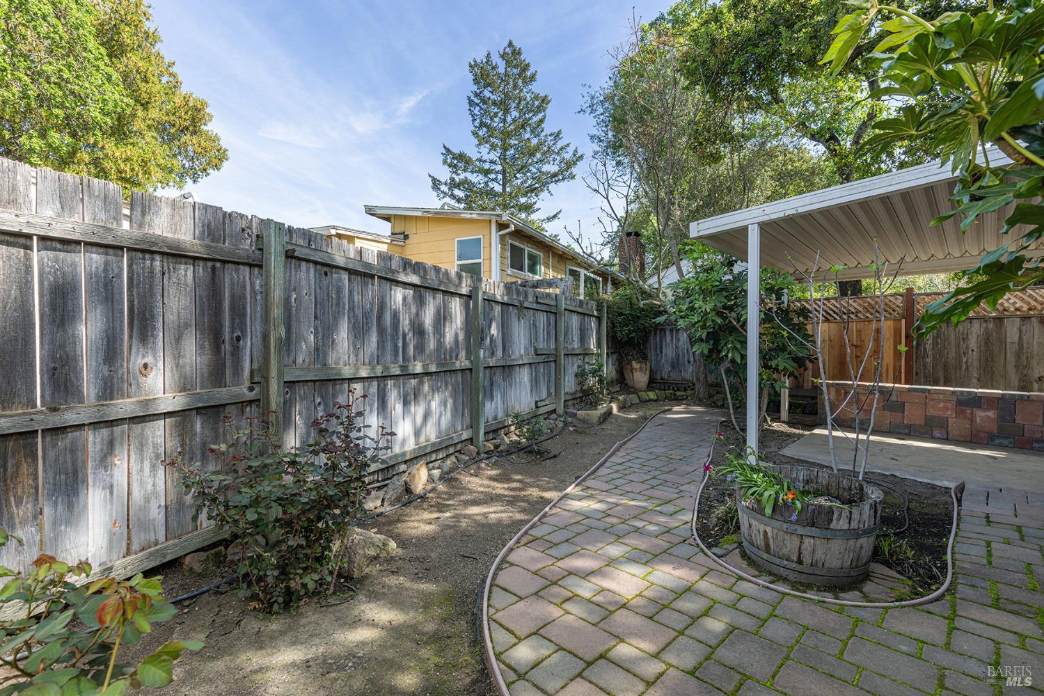 18090 Las Lomas Road Sonoma, CA 95476 - Photo 33 of 37 a backyard of a house with lots of green space