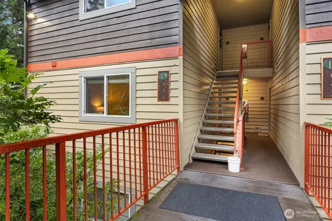 a view of a balcony with stairs