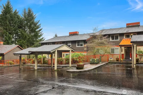 swimming pool view with a seating space