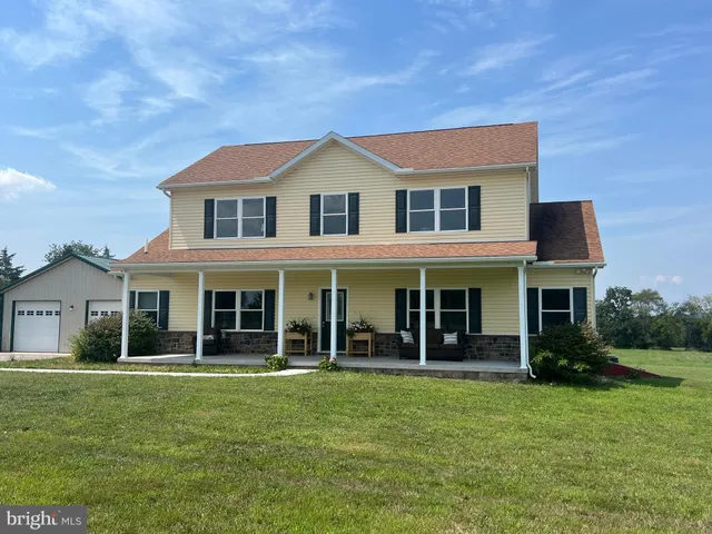 a view of a house with a garden