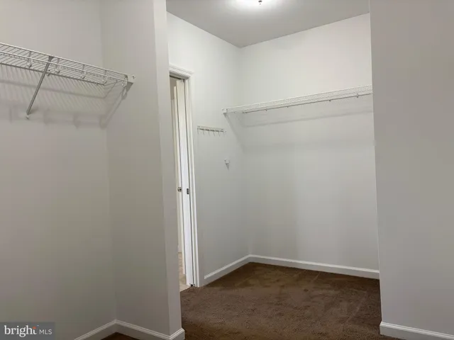 a bathroom with a shower and a bath tub