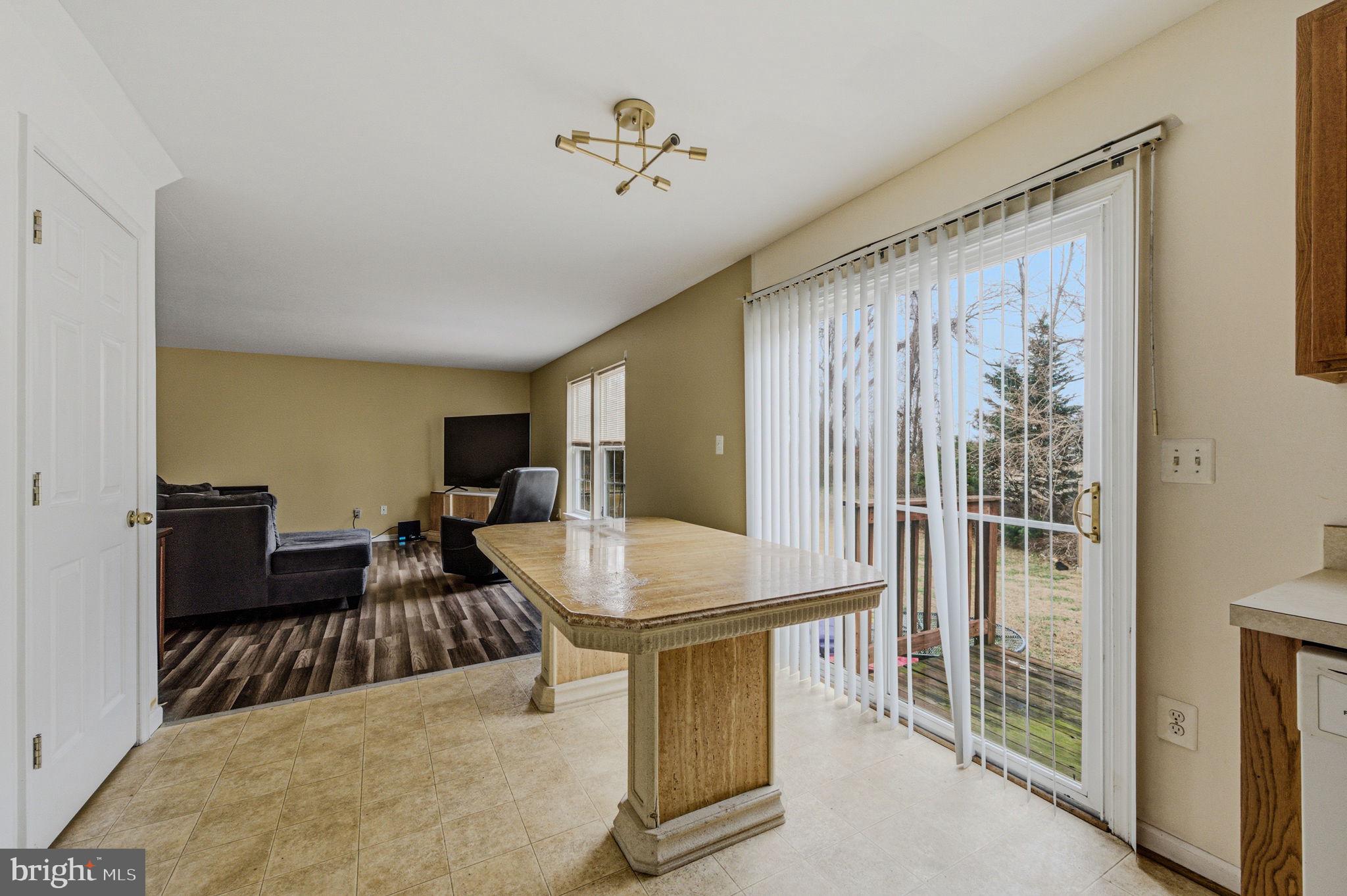 99 Jack's Way Camden, DE 19934 - Photo 12 of 30 a livingroom with furniture window and wooden floor