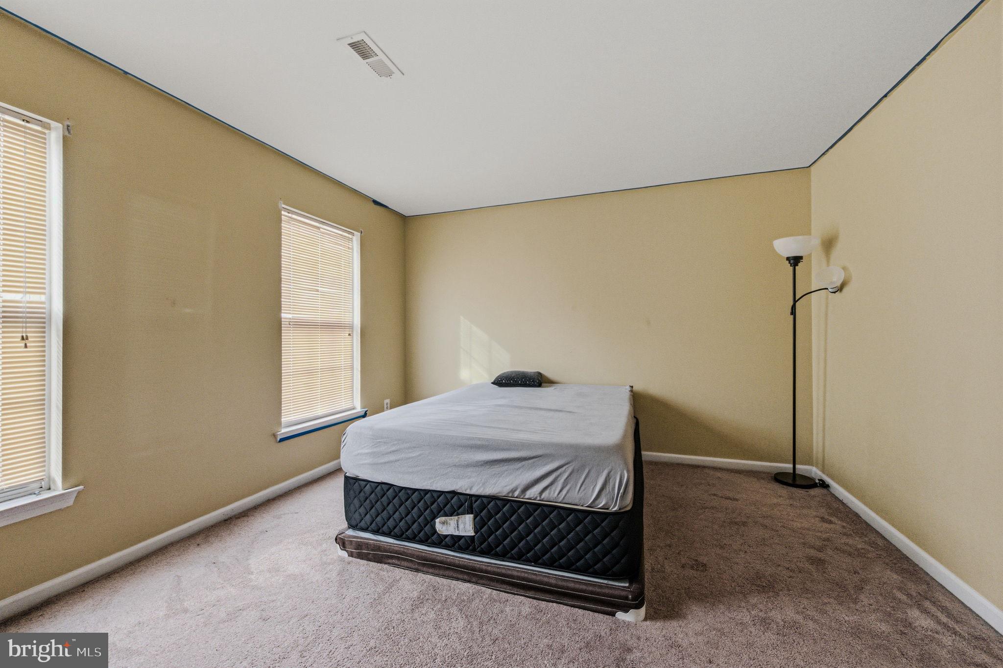 99 Jack's Way Camden, DE 19934 - Photo 24 of 30 a room with a bed and a window