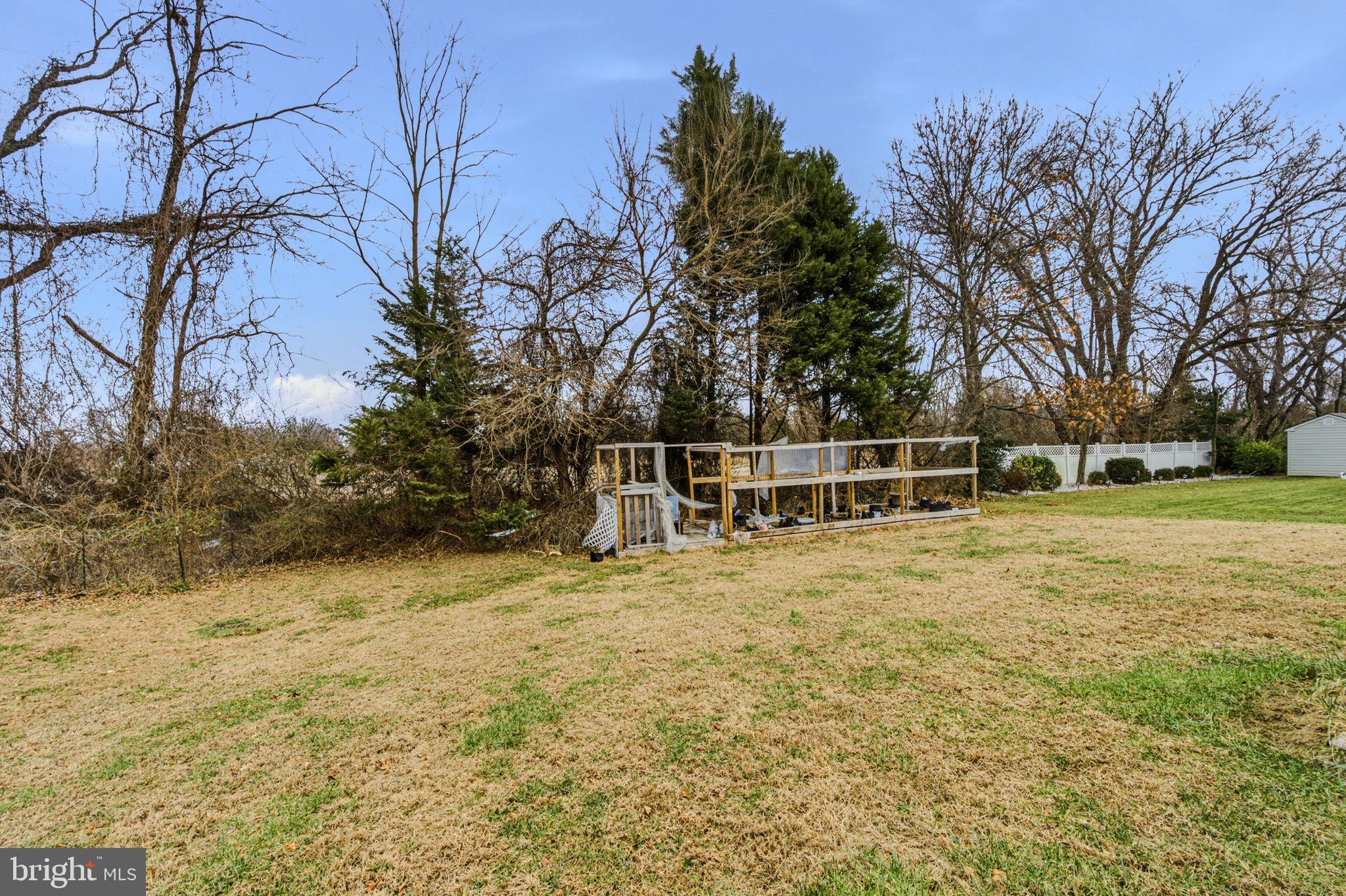 99 Jack's Way Camden, DE 19934 - Photo 28 of 30 a view of a yard with plants and trees