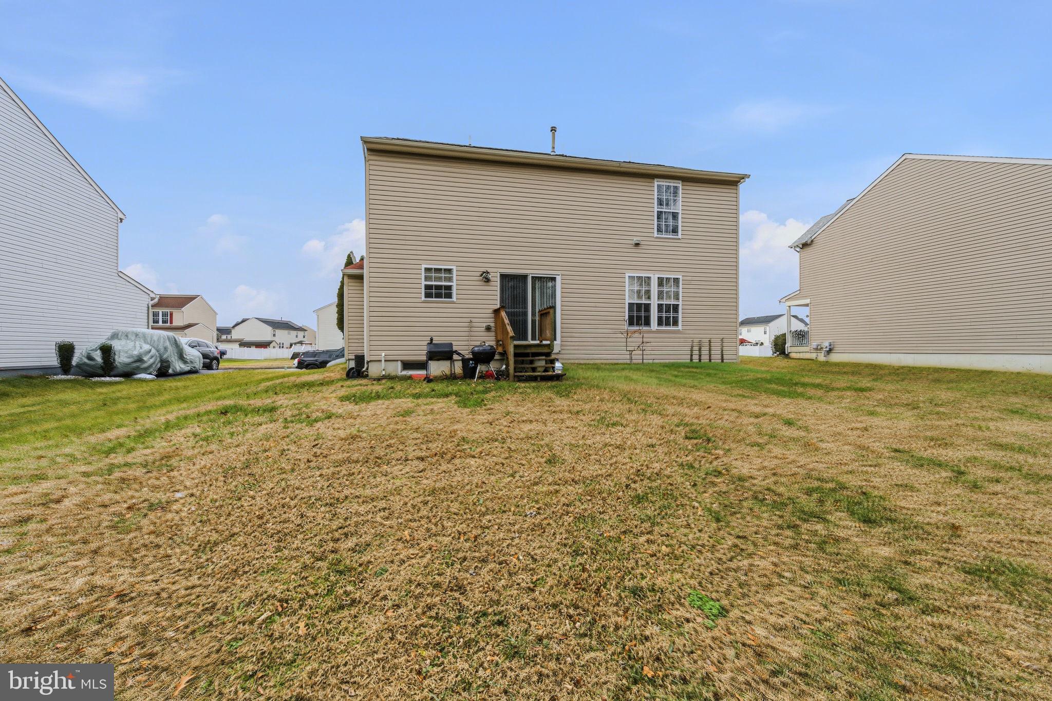 99 Jack's Way Camden, DE 19934 - Photo 30 of 30 a view of a house with yard and sitting area