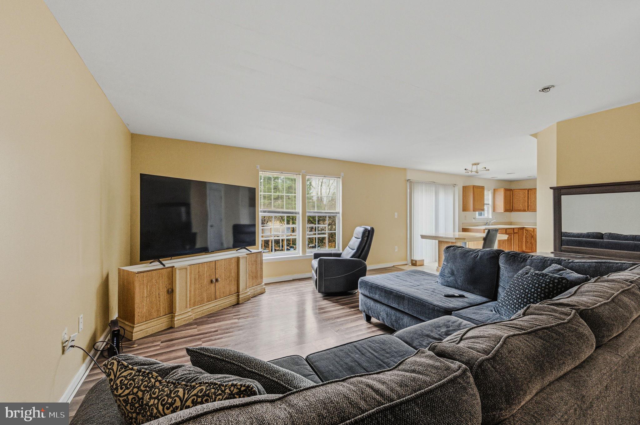 99 Jack's Way Camden, DE 19934 - Photo 9 of 30 a living room with furniture and a flat screen tv
