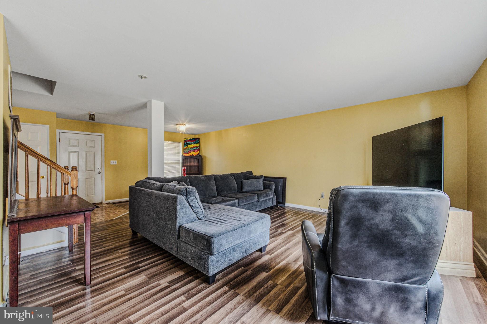 99 Jack's Way Camden, DE 19934 - Photo 10 of 30 a living room with furniture and a flat screen tv