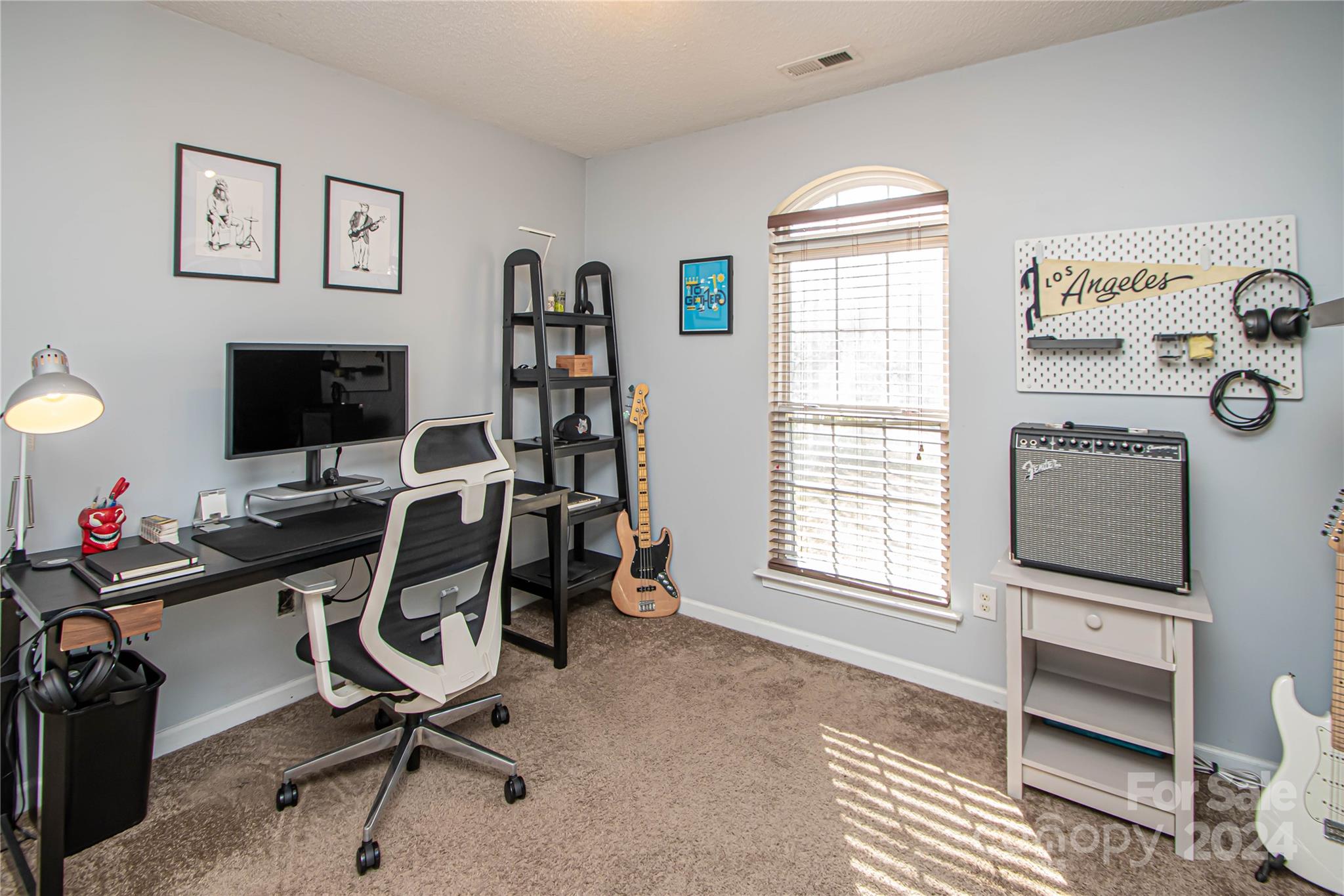 10135 Faires Farm Road Charlotte, NC 28213 - Photo 23 of 31 a view of a workspace with furniture and a window
