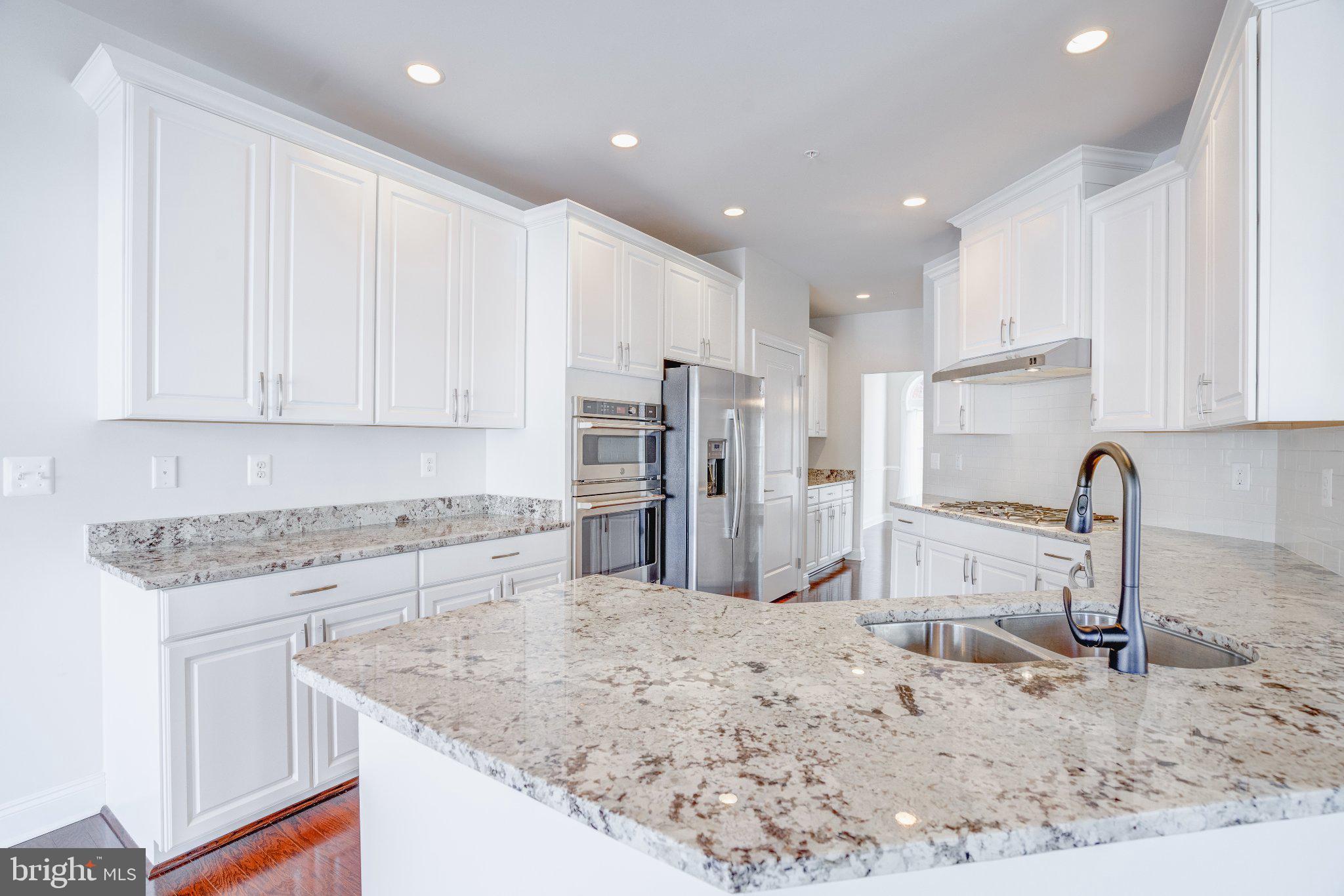 2517 Cherry Tree Road Hanover, MD 21076 - Photo 15 of 61 Sleek modern kitchen with elegant finishes.