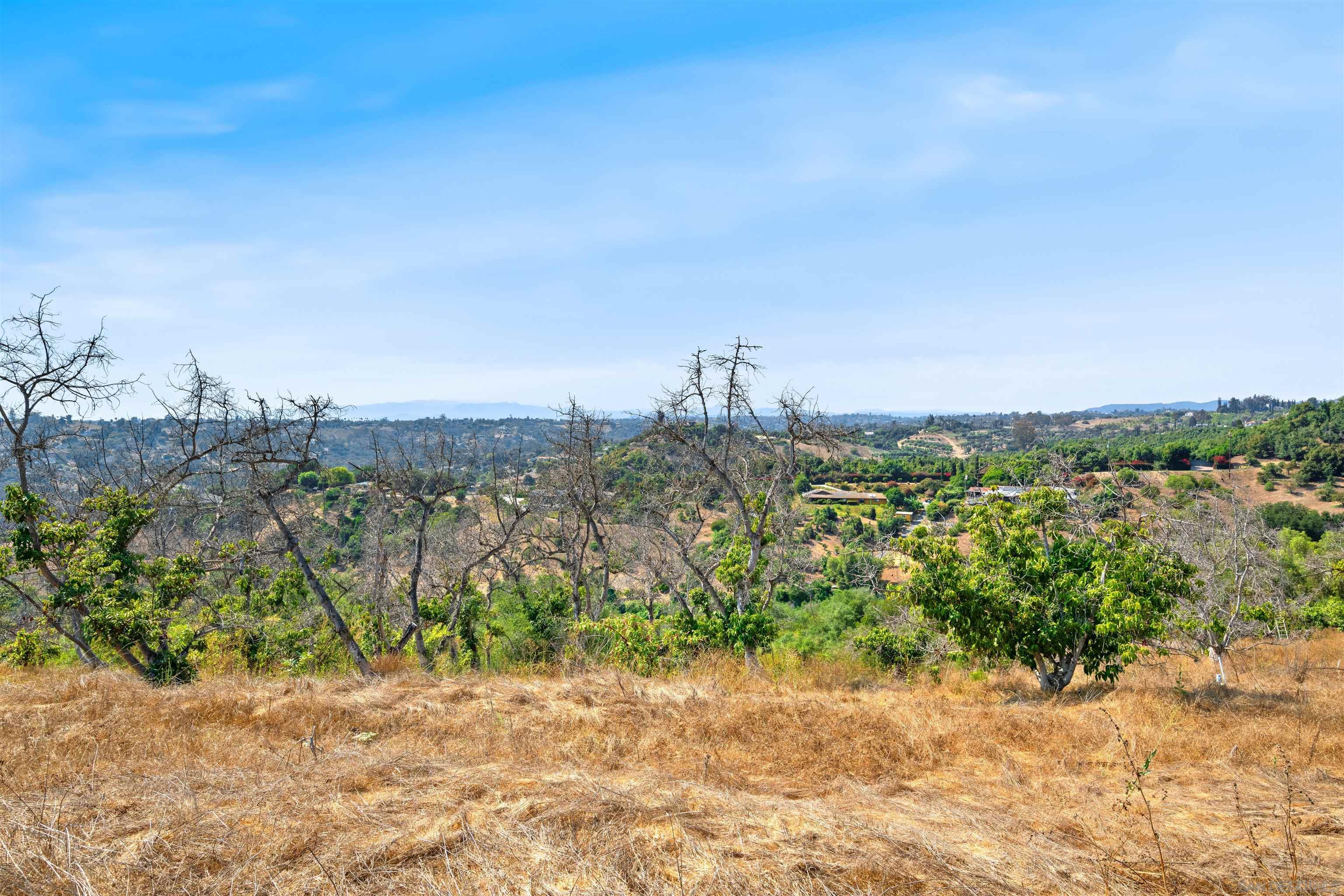 3240 Vía Del Cielo Fallbrook, CA 92028 - Photo 15 of 23 a view of a lake with a city