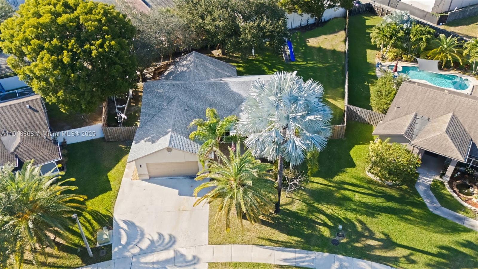 4201 Southwest 78th Drive Davie, FL 33328 - Photo 28 of 28 an aerial view of a house with a yard and garden