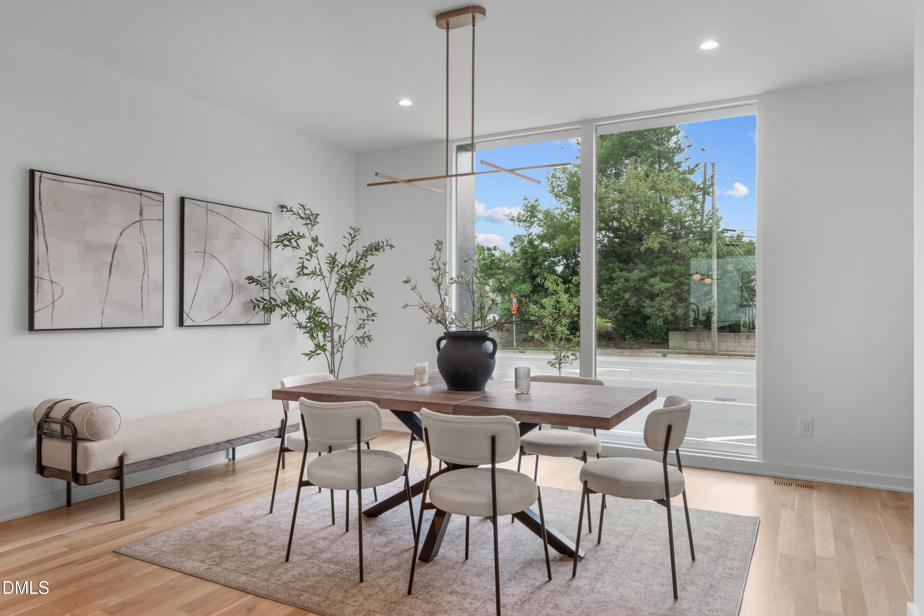 1307 Chamblee Hl Court Raleigh, NC 27608 - Photo 15 of 65 a view of a dining room with furniture window and wooden floor