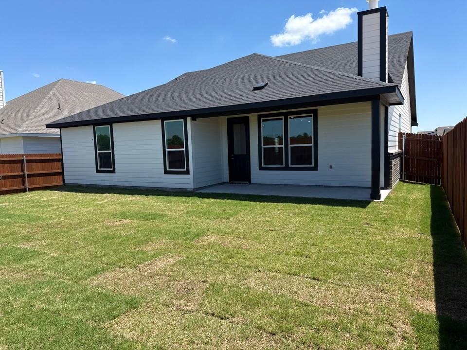 1325 Frio Drive Springtown, TX 76082 - Photo 9 of 10 a view of a house with a garden