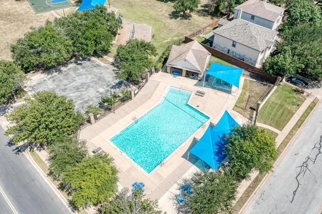 a view of a yard with tree s