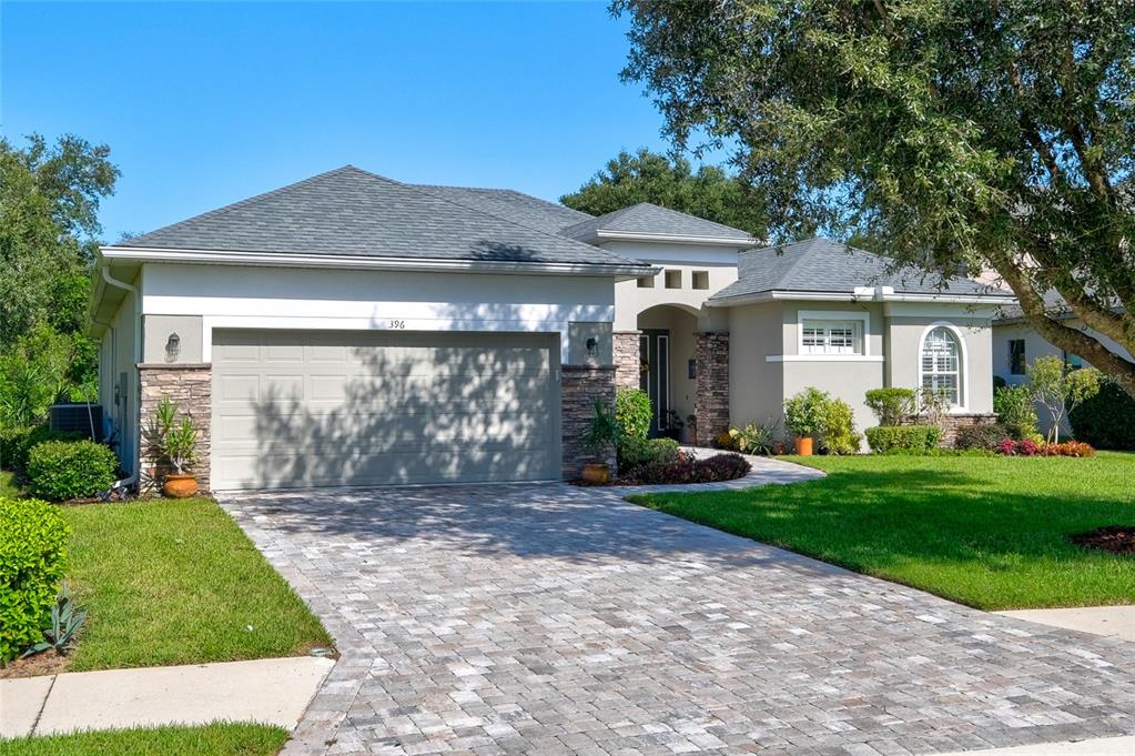 396 Snapdragon Loop Bradenton, FL 34212 - Photo 1 of 1 a front view of a house with garden