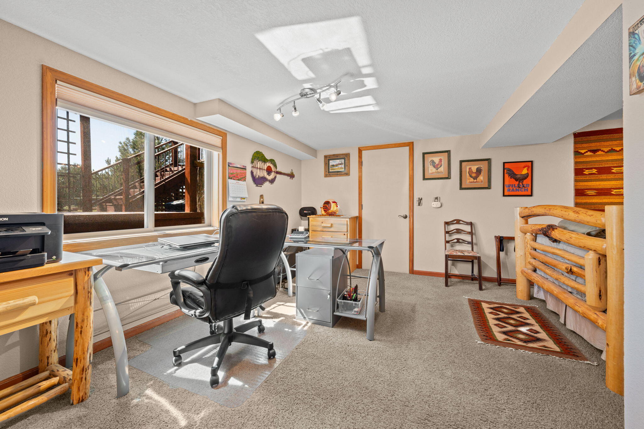 17375 Jordan Road Sisters, OR 97759 - Photo 44 of 63 Versatile lower room can be used as a fourth bedroom or office.