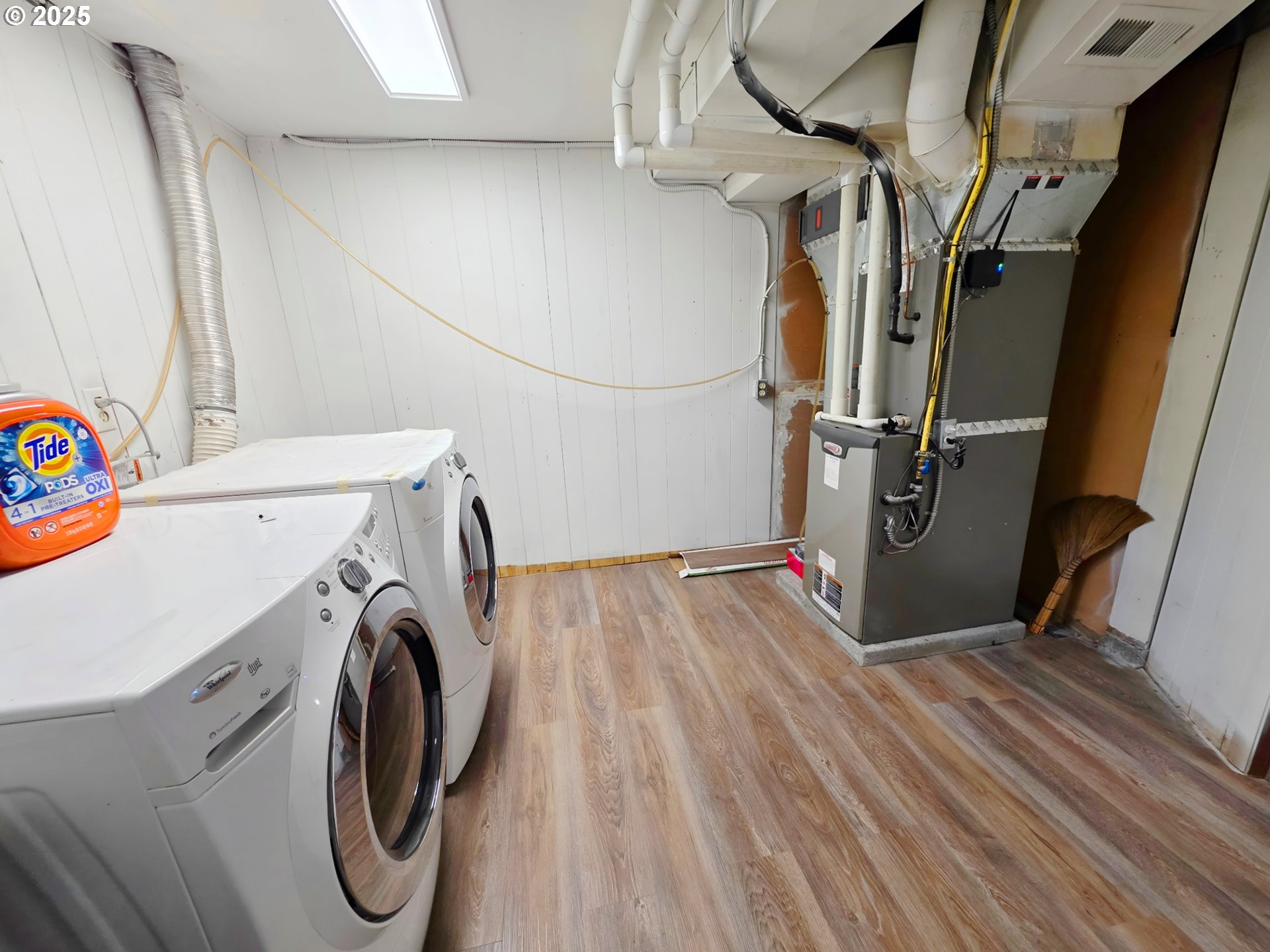 11910 Northeast Fremont Street Portland, OR 97220 - Photo 12 of 23 a view of a storage & utility room with washer and dryer