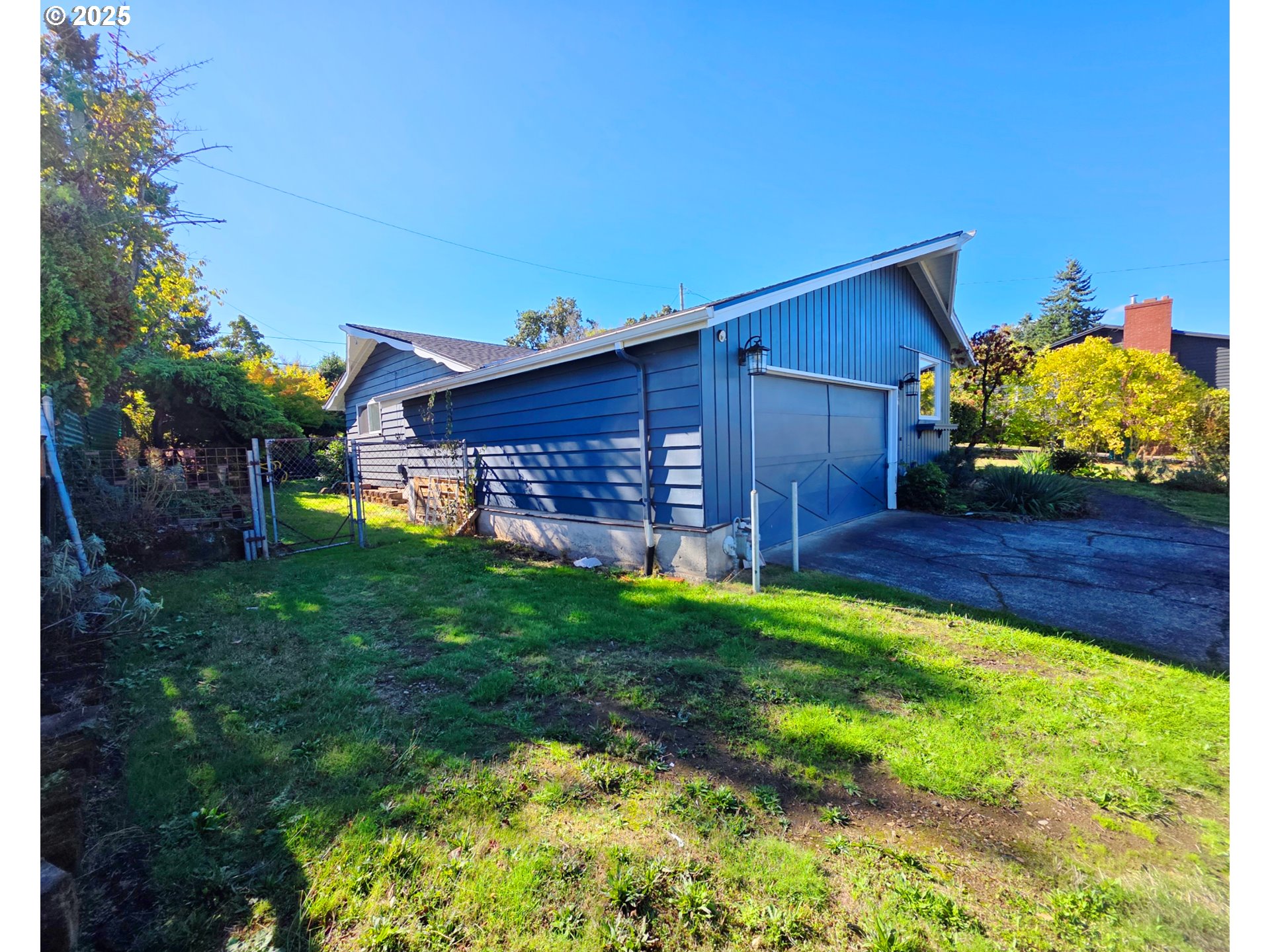 11910 Northeast Fremont Street Portland, OR 97220 - Photo 23 of 23 a view of a house with a backyard