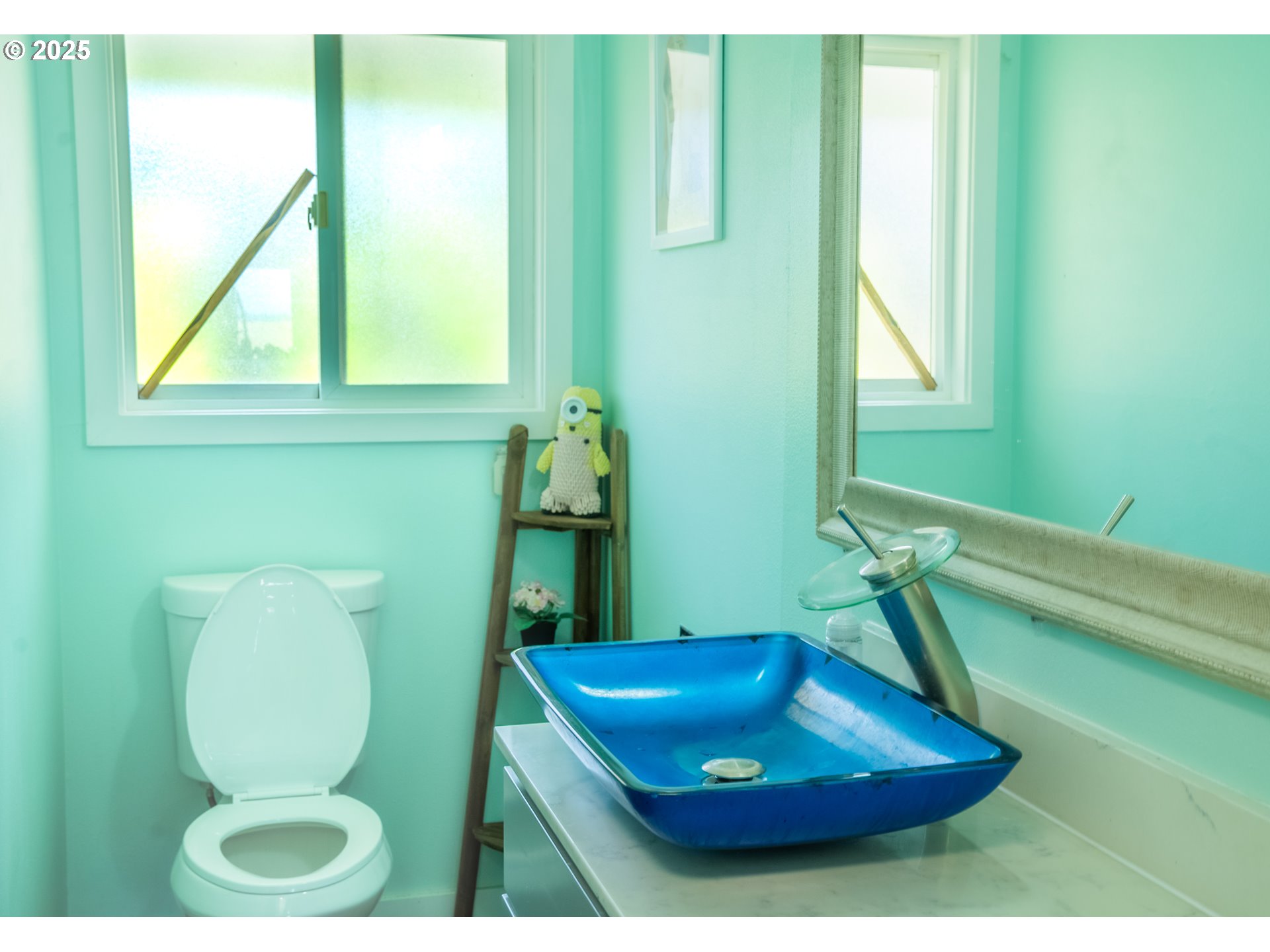 11910 Northeast Fremont Street Portland, OR 97220 - Photo 10 of 23 a bathroom with a toilet and a sink